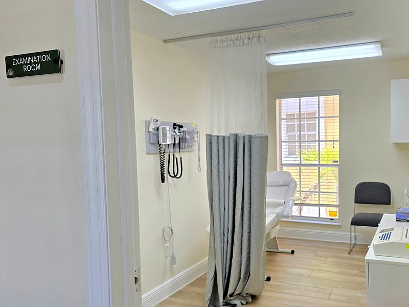Examination room with exam table and vital-signs equipment